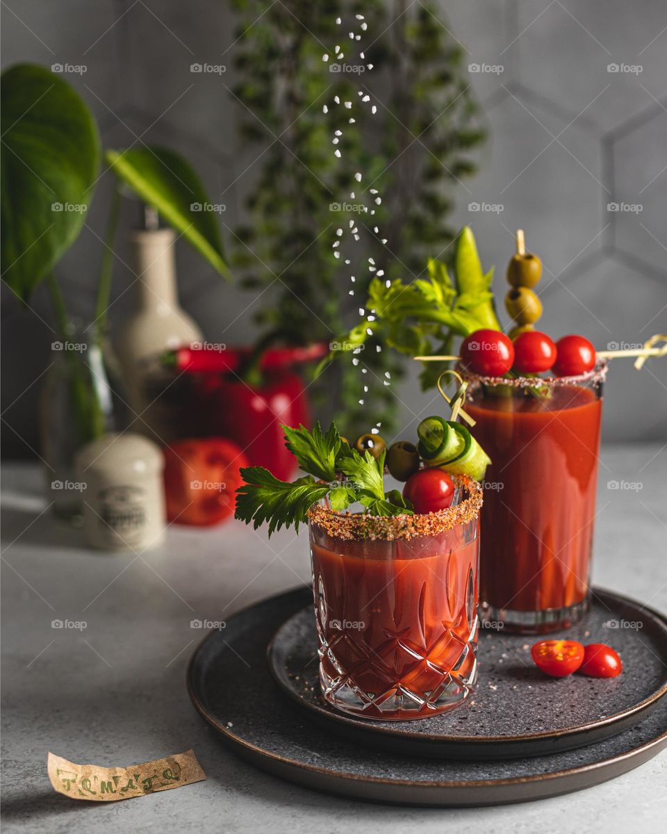 Tomato juice decorated with vegetables 