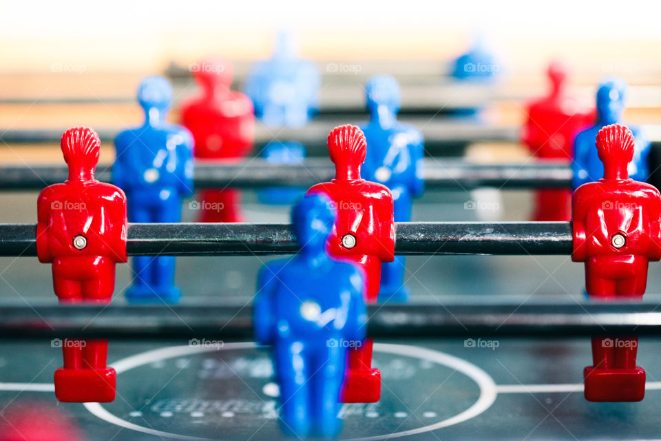 Table football game sport competition two competitors players on field. Closeup of players