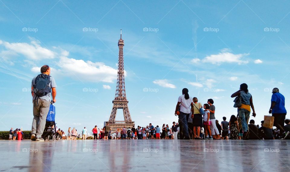 Photo of the street from underneath the Eiffel Tower