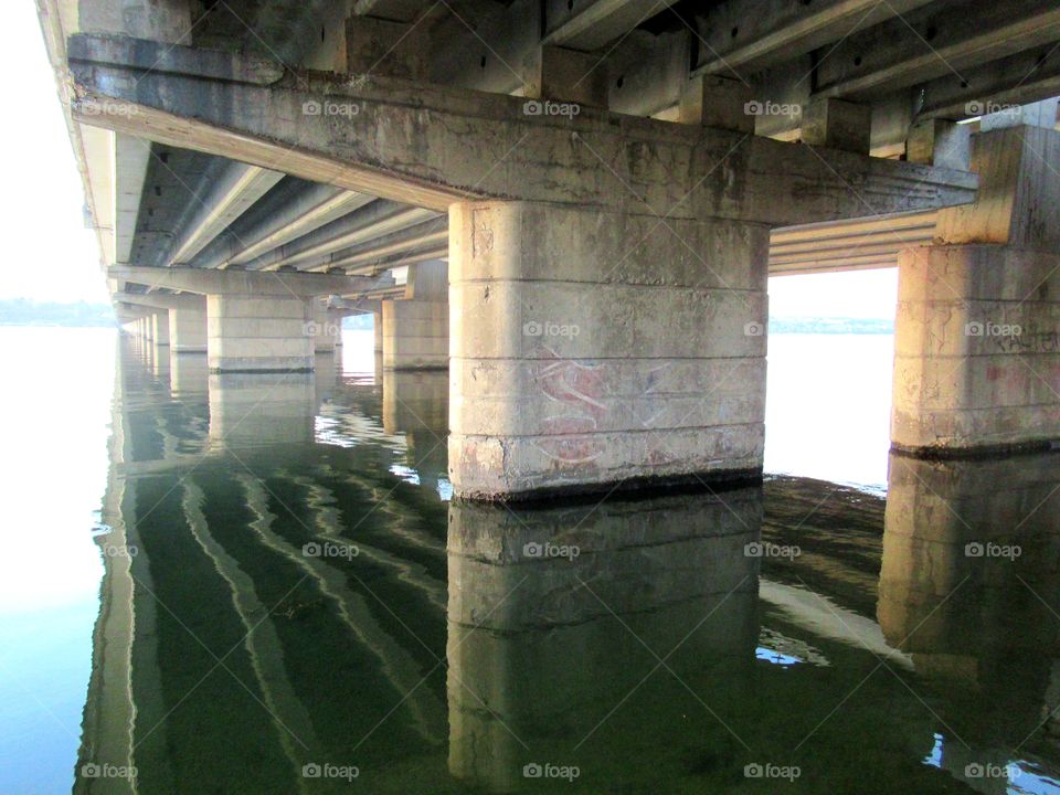 under the bridge on the river