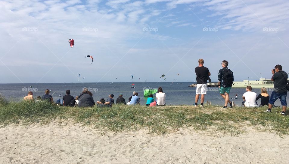 People watching kitesurfers, Malmö Sweden.