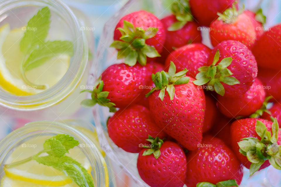 Fresh strawberries in glass bowl