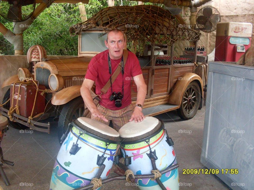 Playing on bongos 