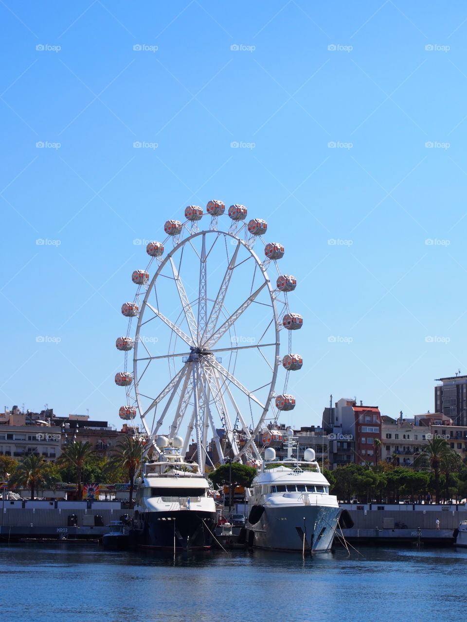 Attraction and boats in the port of barcelona