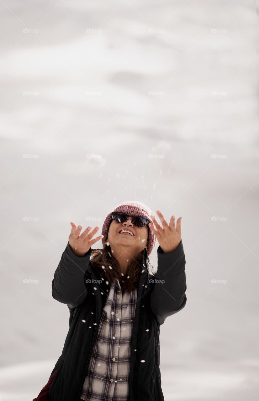 Portrait of a woman enjoying the snow 