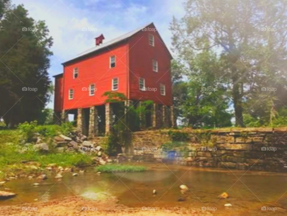 red millhouse on dammed creek or river in pallmall Tennessee