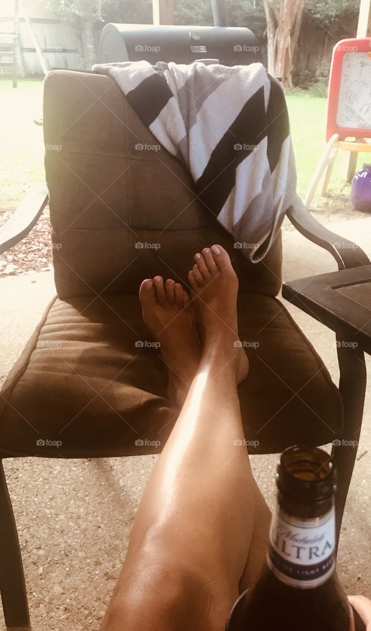 Relaxing with your feet up, barefooted, on a Friday afternoon with a cold beer in hand on the back porch. Life doesn’t get much better than this!
