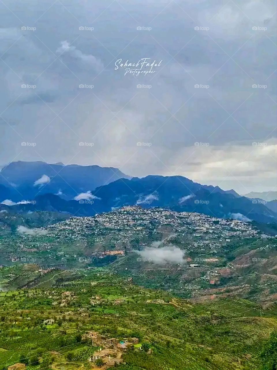 Glory be to God, the magnificent and picturesque view and the natural green trees are a view that is nothing more wonderful than it