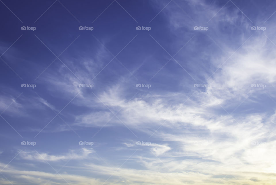 The beauty of the sky with clouds and the sun.