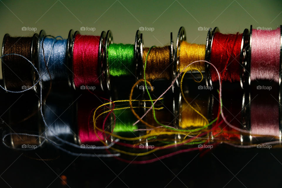 Blue,red ,green ,brown,yellow small thread