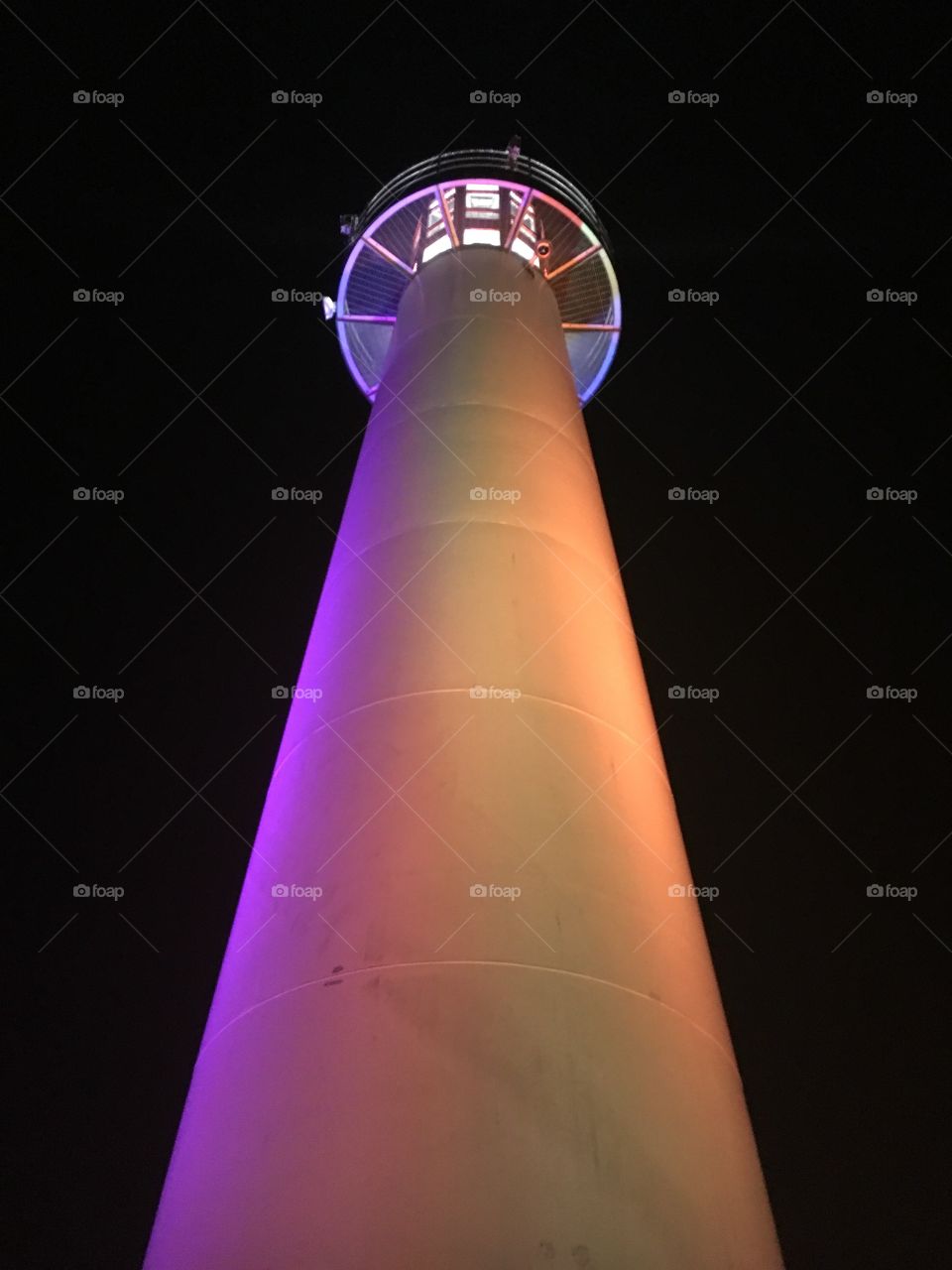 Lighthouse on Long Beach, CA at night.