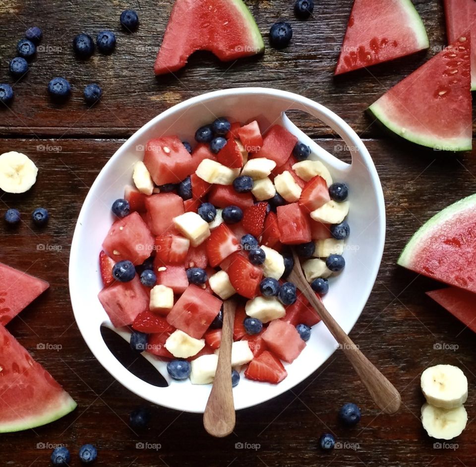 Fourth of July fruit bowl on wood table