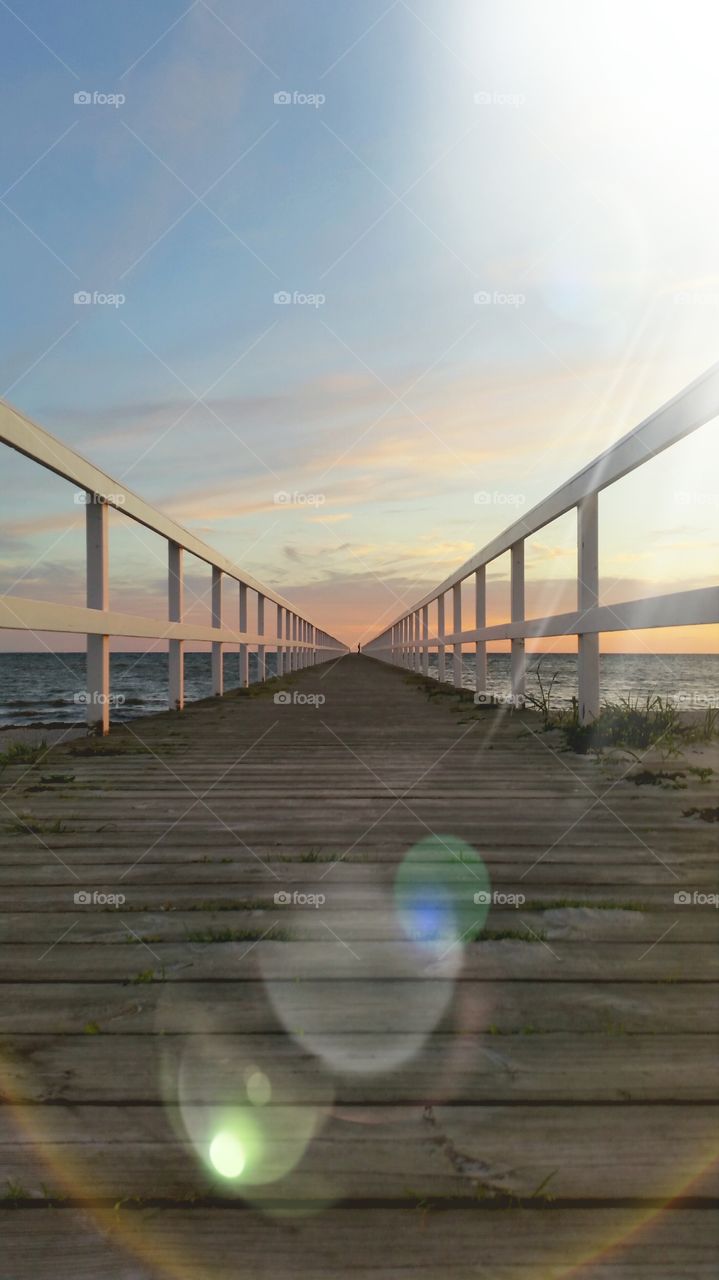 Scenic view of pier on sea