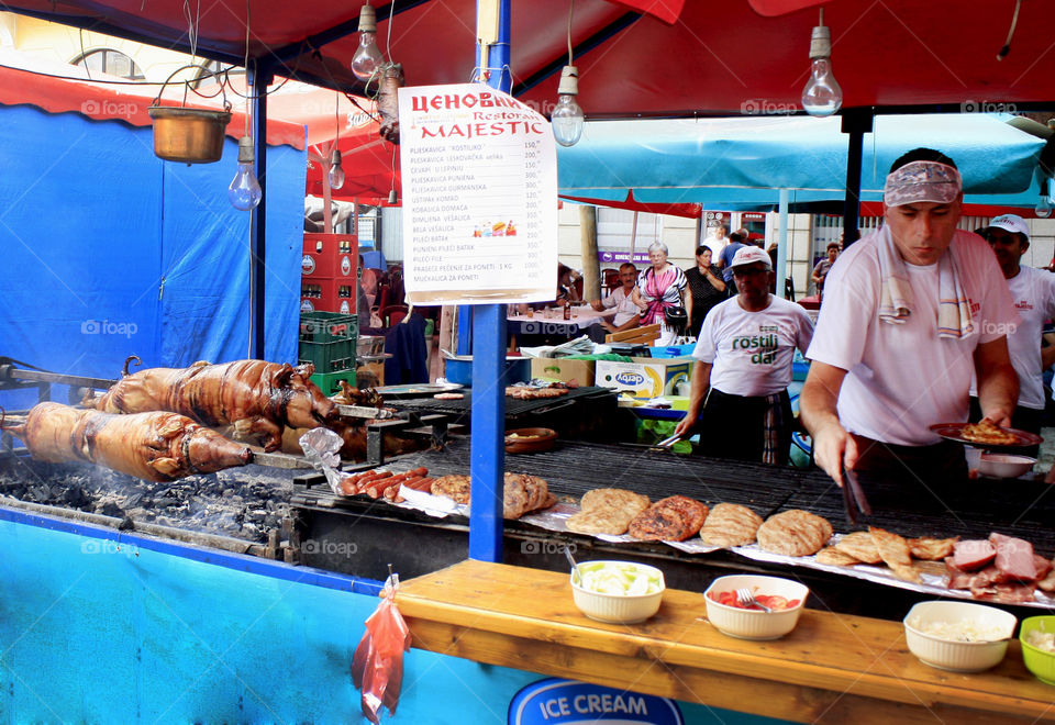 Street market, business, meat preparation