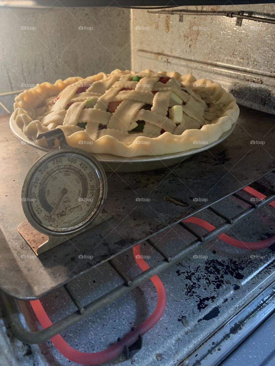 Pie baking in oven