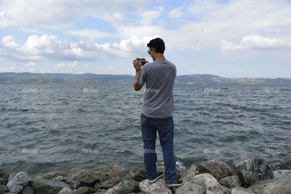 candid of Me taking pictures of the water in Sapanca Turkey