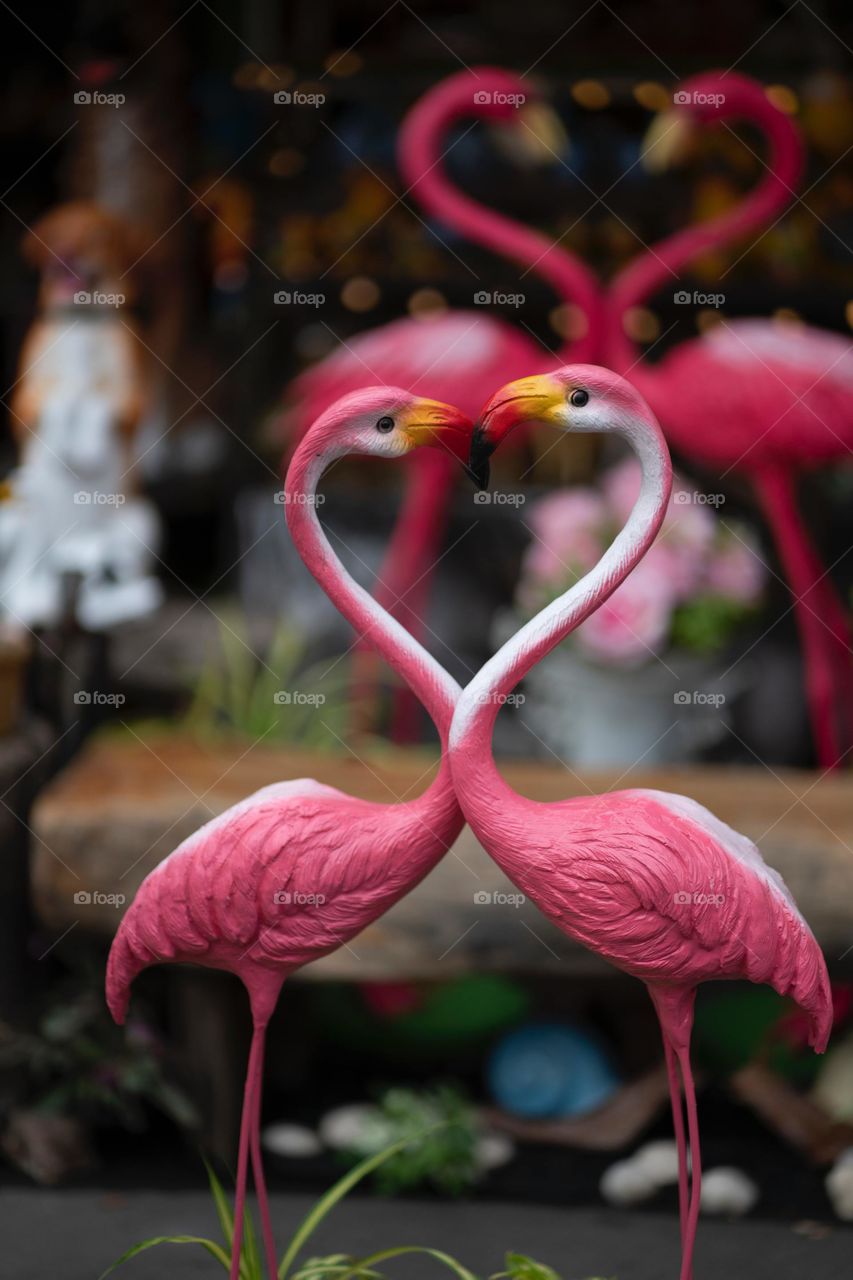 2 pink Flamingo ceramic figurines