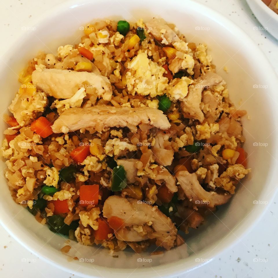 Homemade healthy chicken cauliflower fried rice. Guilt free deliciousness 