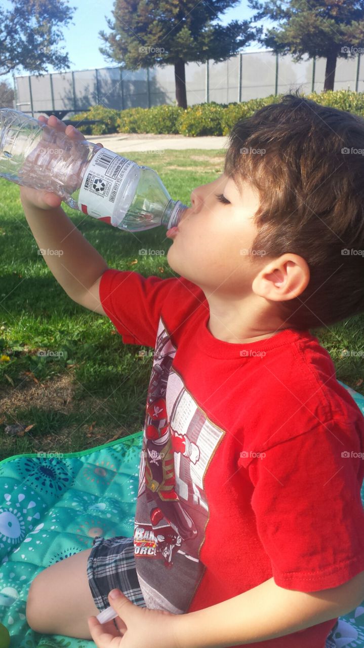 boy drinking water