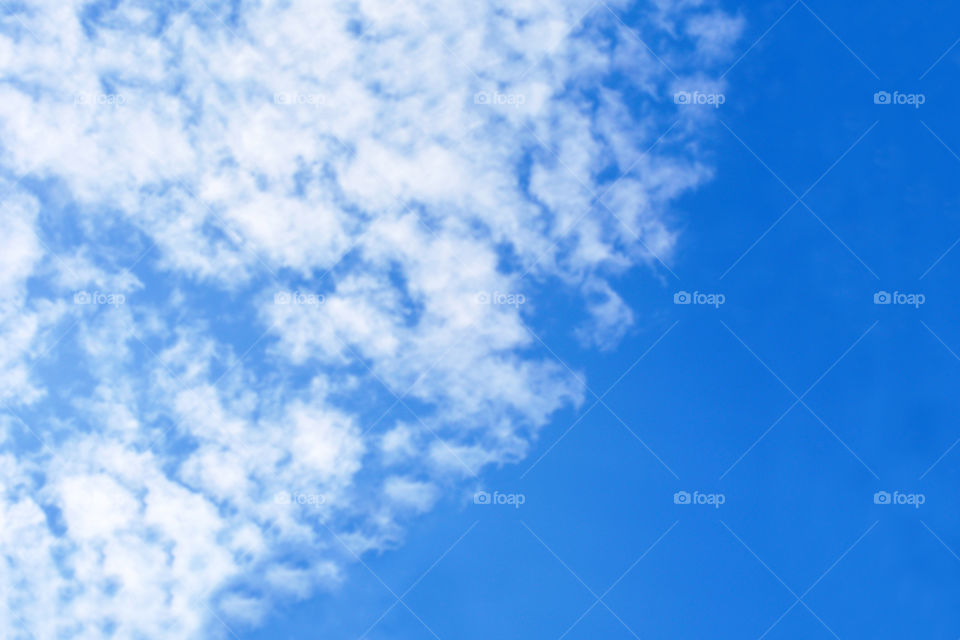 Blue sky with white clouds with copy space.