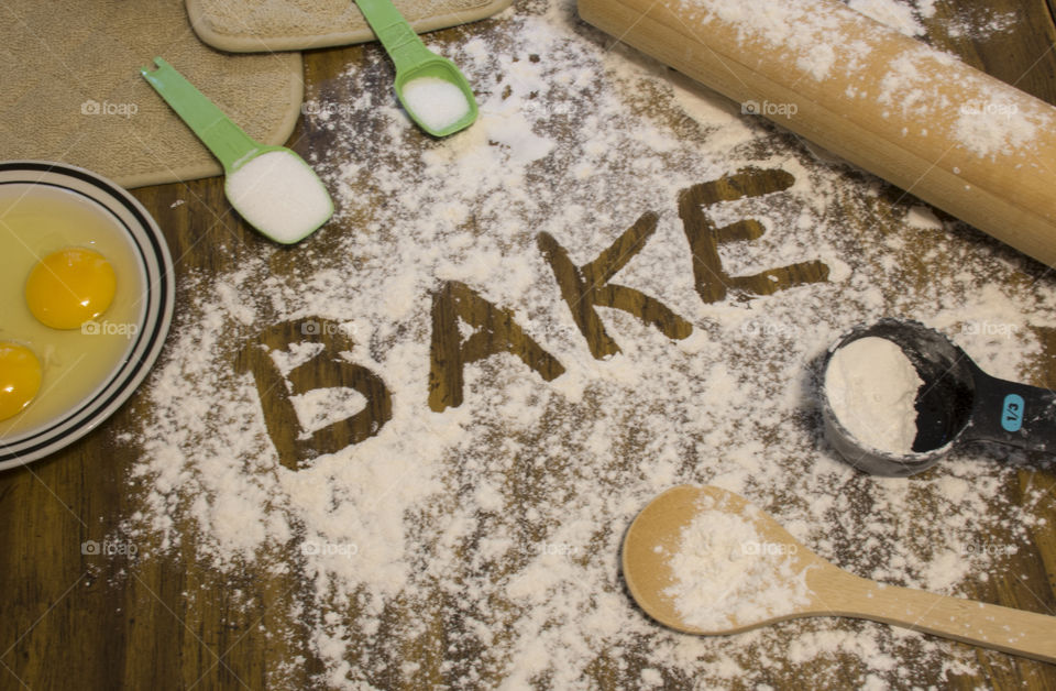 Preparing to bake for the holidays, eggs, flour, sugar, rolling pin