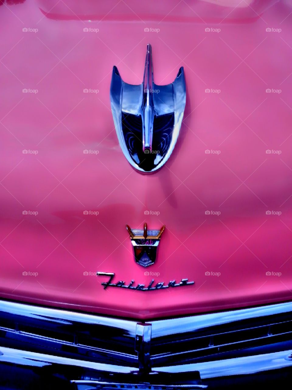 pink. hood of an old fairlane