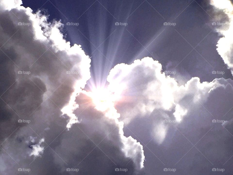 Sunrays through clouds. Sunrays through clouds after a Florida , Summer storm.