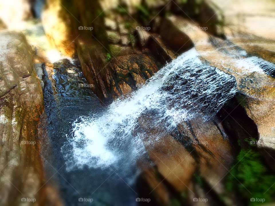 Mountain waterfall with blurred effect