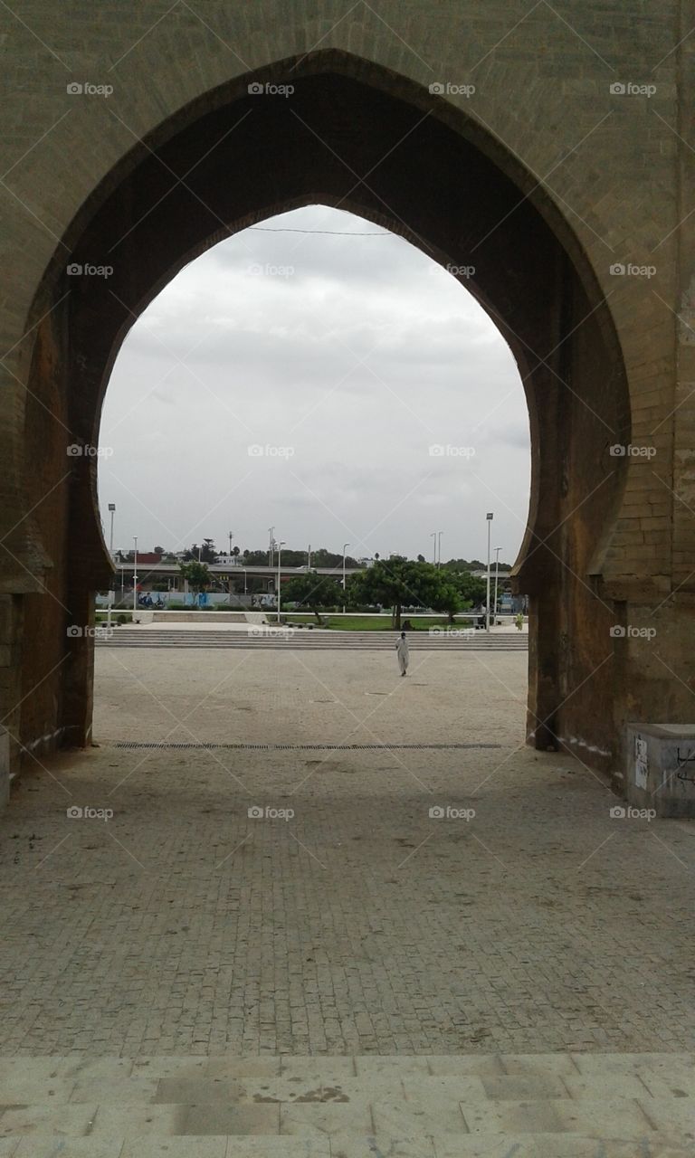 a large door of the old medina. view from inside