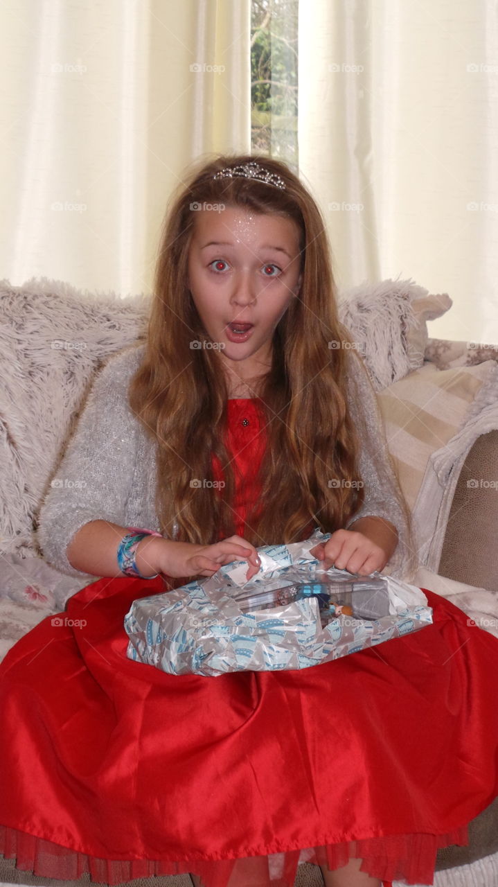surprised child unwrapping