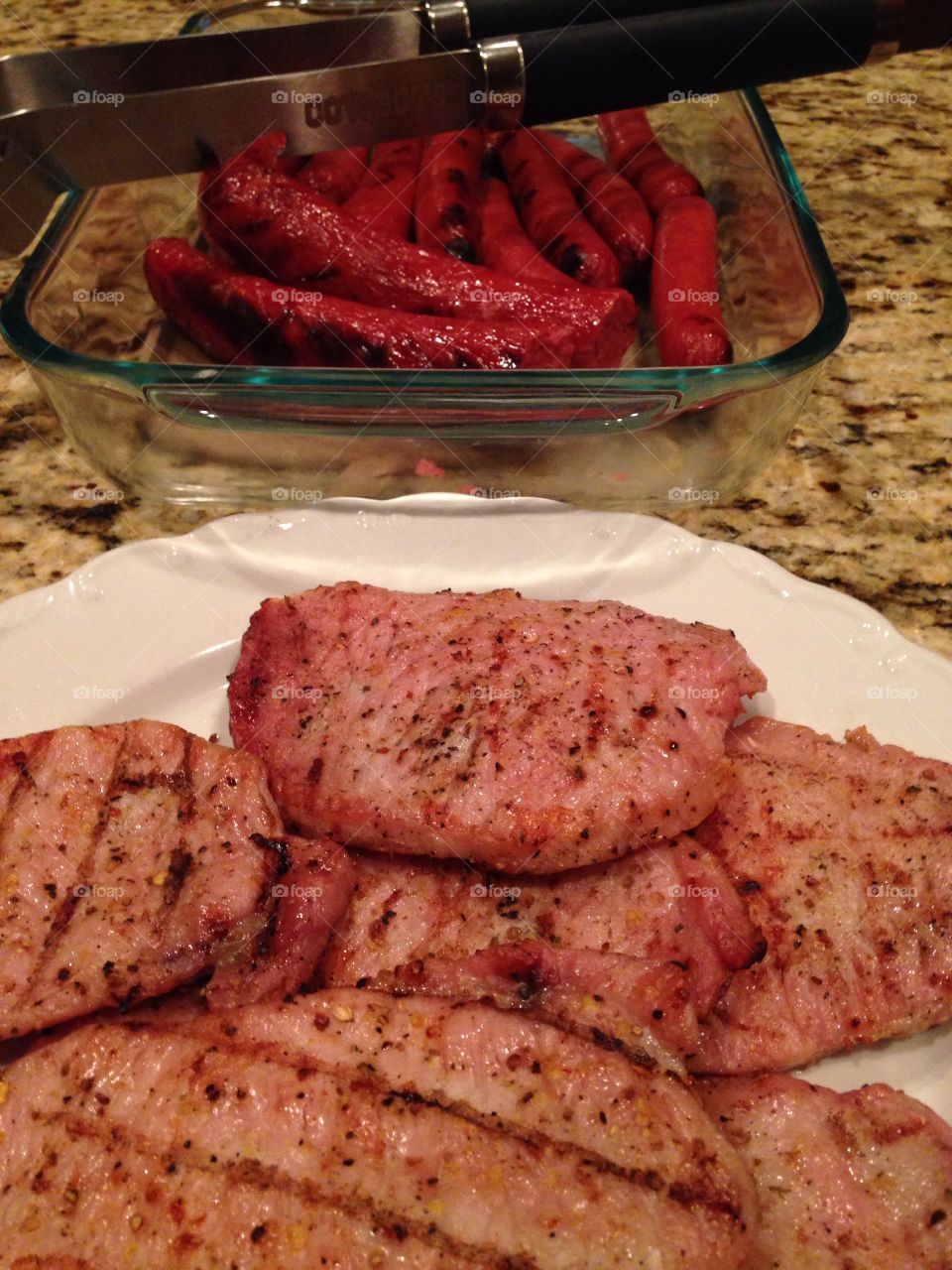 Yum. Pork chops and sausage fresh off the grill