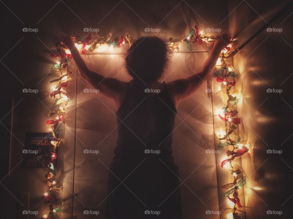 Hanging up the Christmas lights 