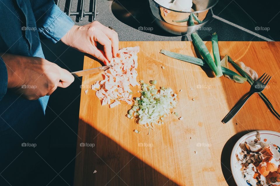 High angle view of person cutting vegetables