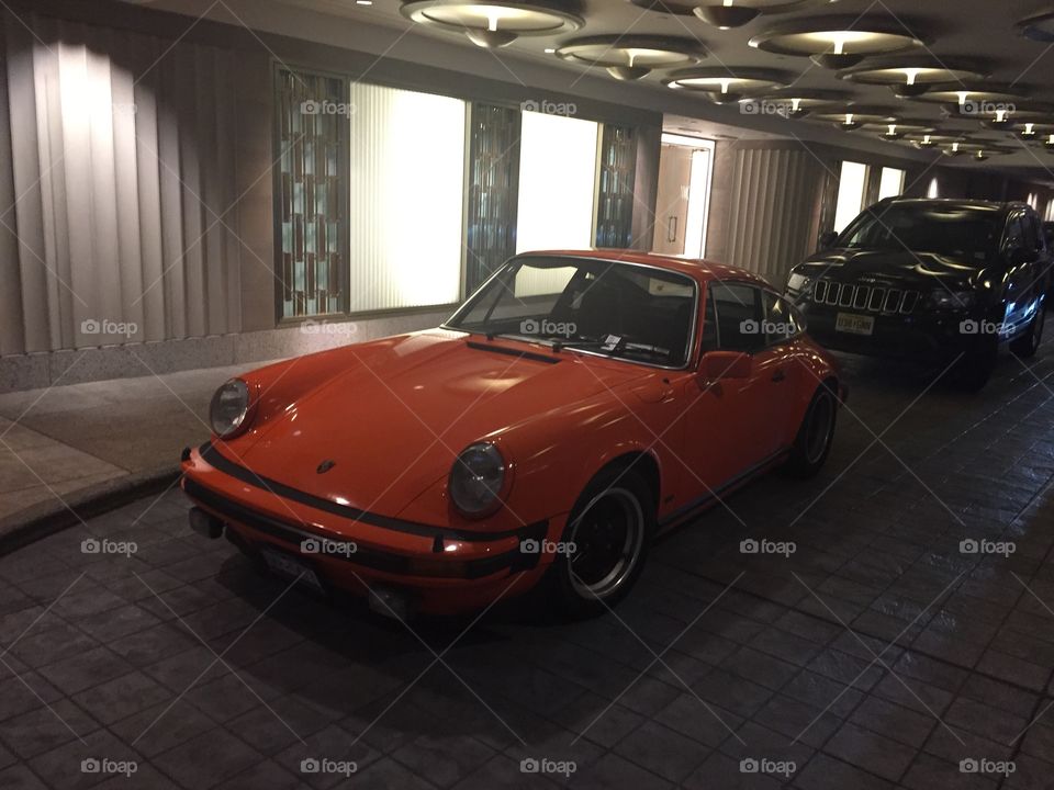Orange Porsche Waldorf Astoria 