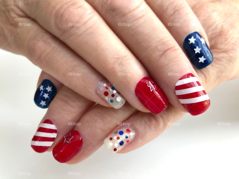 A festive 4th of July gel nail manicure.