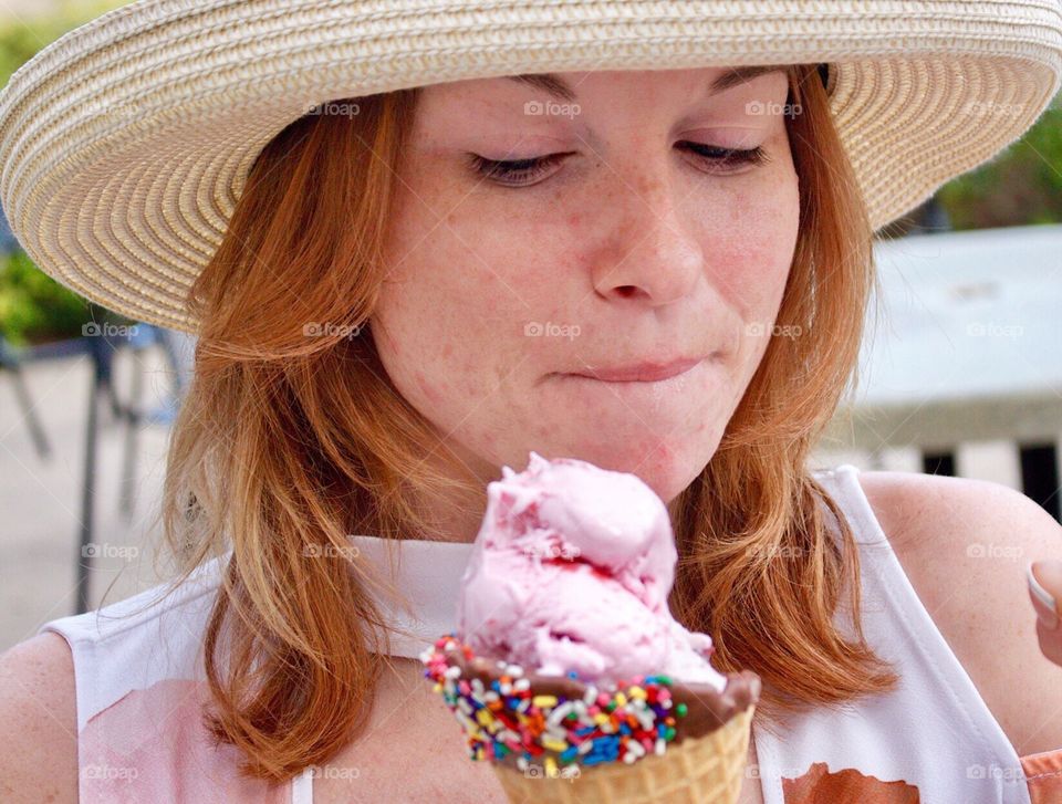 Strawberry Icecream with chocolate dipped waffle cone and sprinkles, so delicious on a hot summer day 🍦