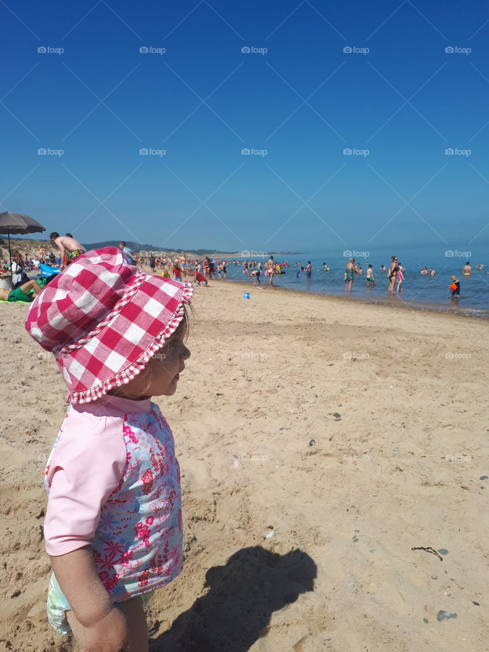 Toddler by the sea