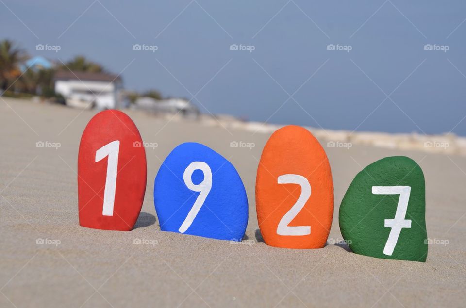 Year 1927 on colourful stones