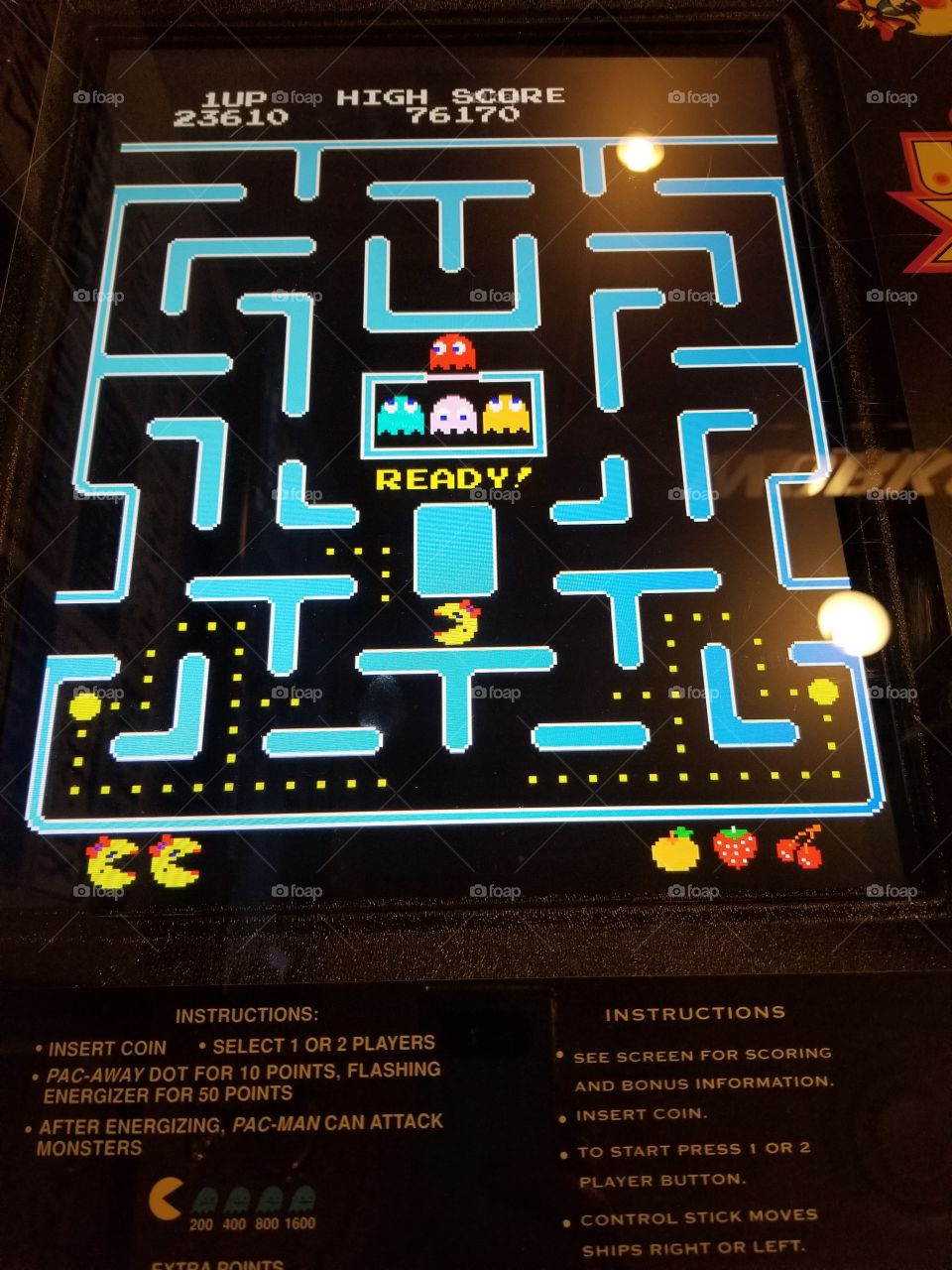 Playing Ms. Pacman video game