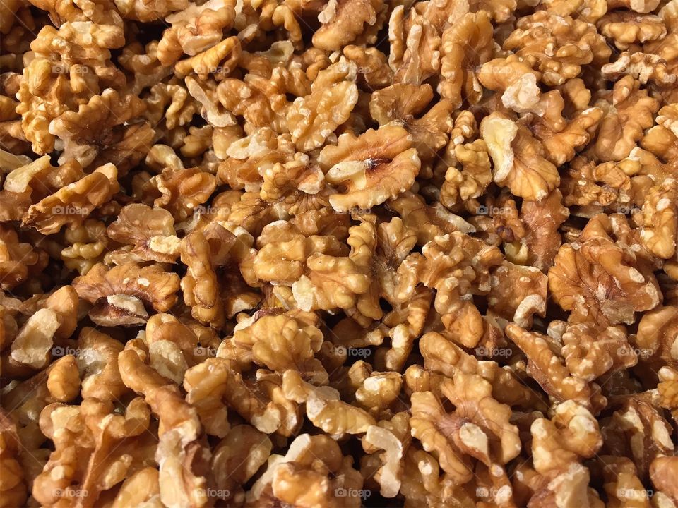 Close up of ripe peeled and dried walnut kernels ready to eat.