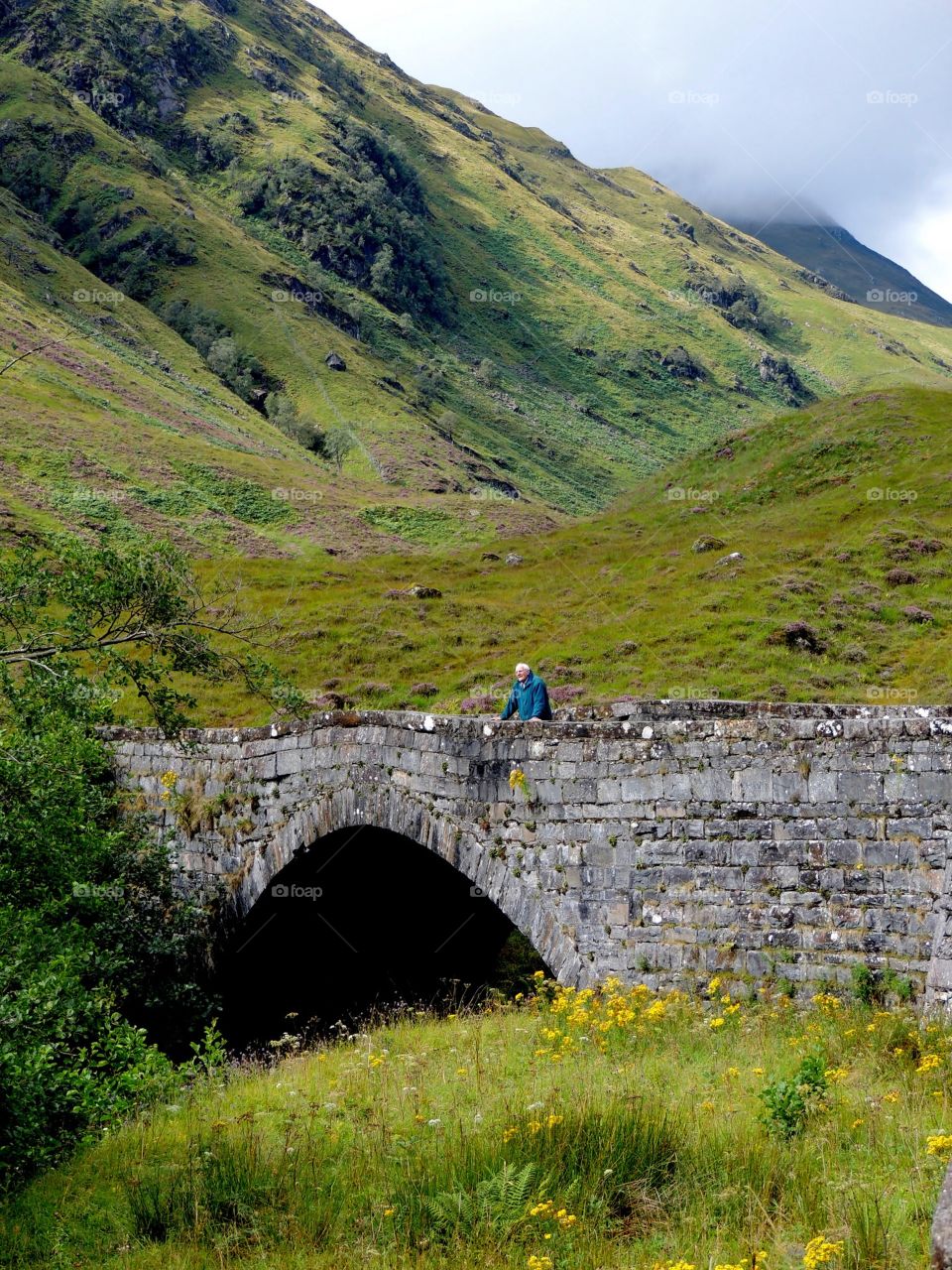 Man on a bridge