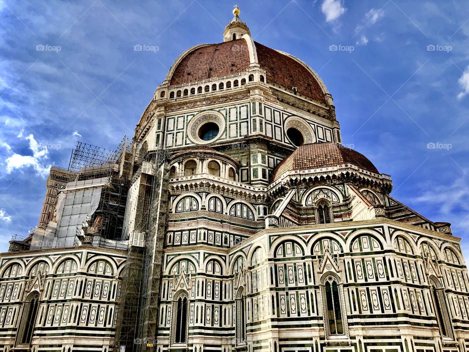 The Duomo in Florence Italy with a blue sky