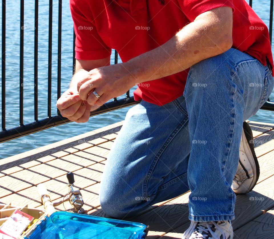 Man preparing fishing line