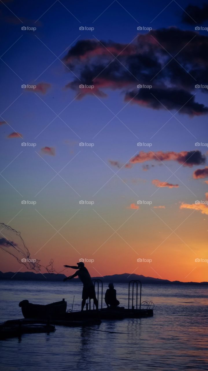 Fisherman at sunset 