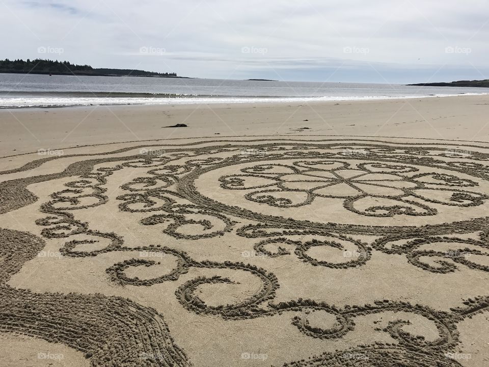 A lovely day spent drawing on the beach and eventually giving it all back when the tide comes in. 