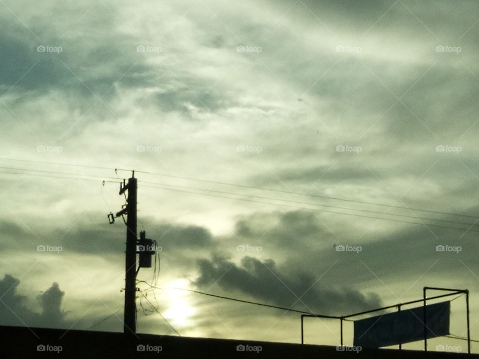 sun and dark clouds