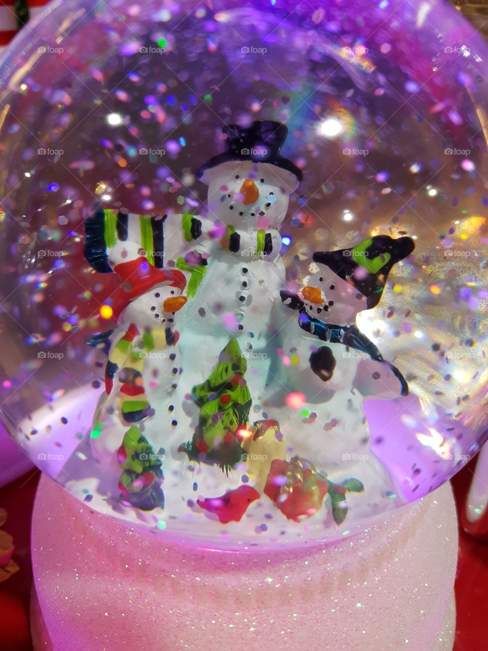 snow man on a snow globe