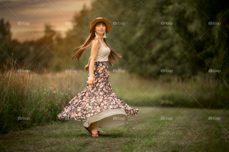 Beautiful young woman outdoor portrait in boho style