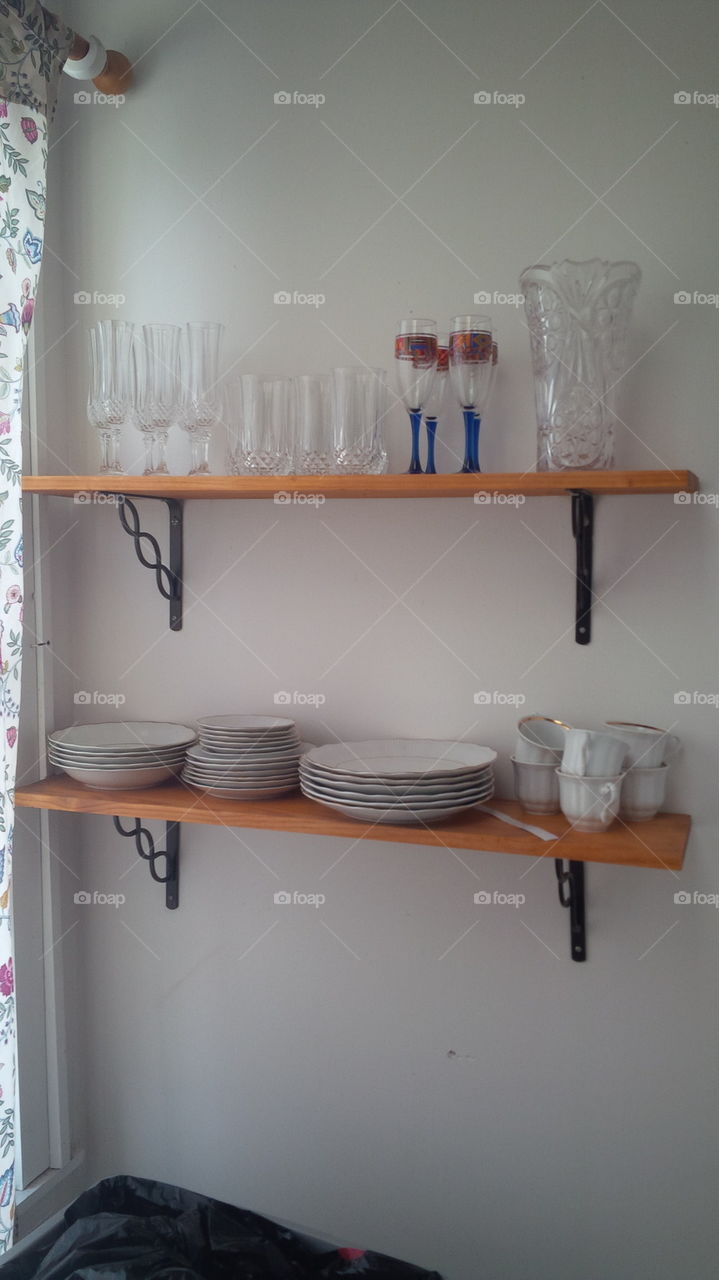 Great white dishes on wall shelves