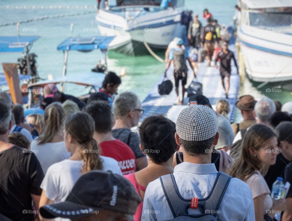 Crowed tourist enjoy their summer on the beautiful island